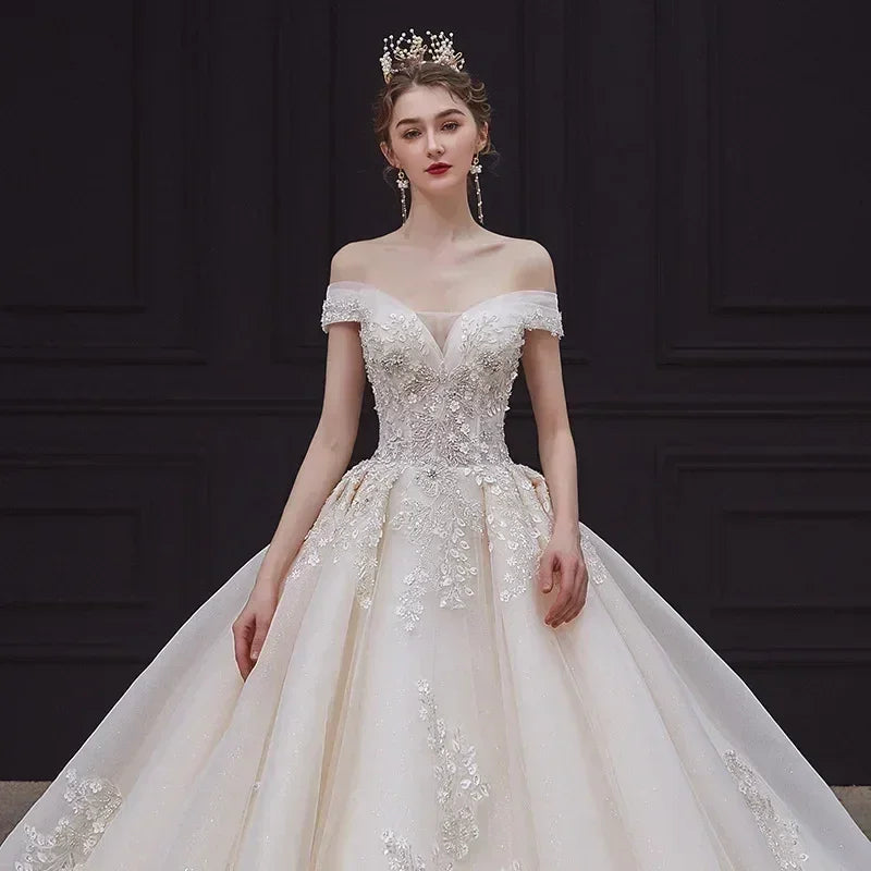 Luxury Off-Shoulder Wedding Dress - Handmade Lace Ball Gown | Femstylo