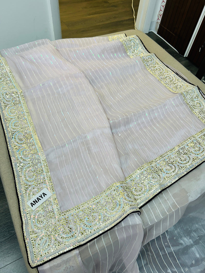 Tissue silk saree with contrast blouse piece