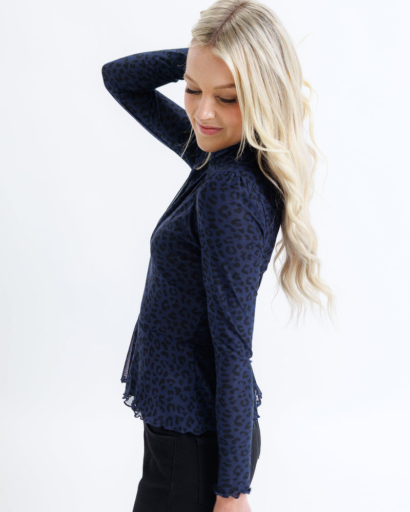 Peplum Turtleneck Top
