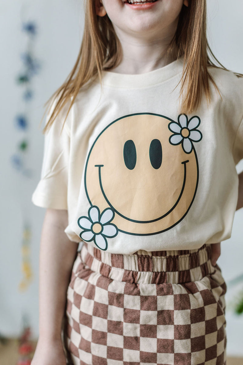 Big Smiley w/ Flowers - Child Tee