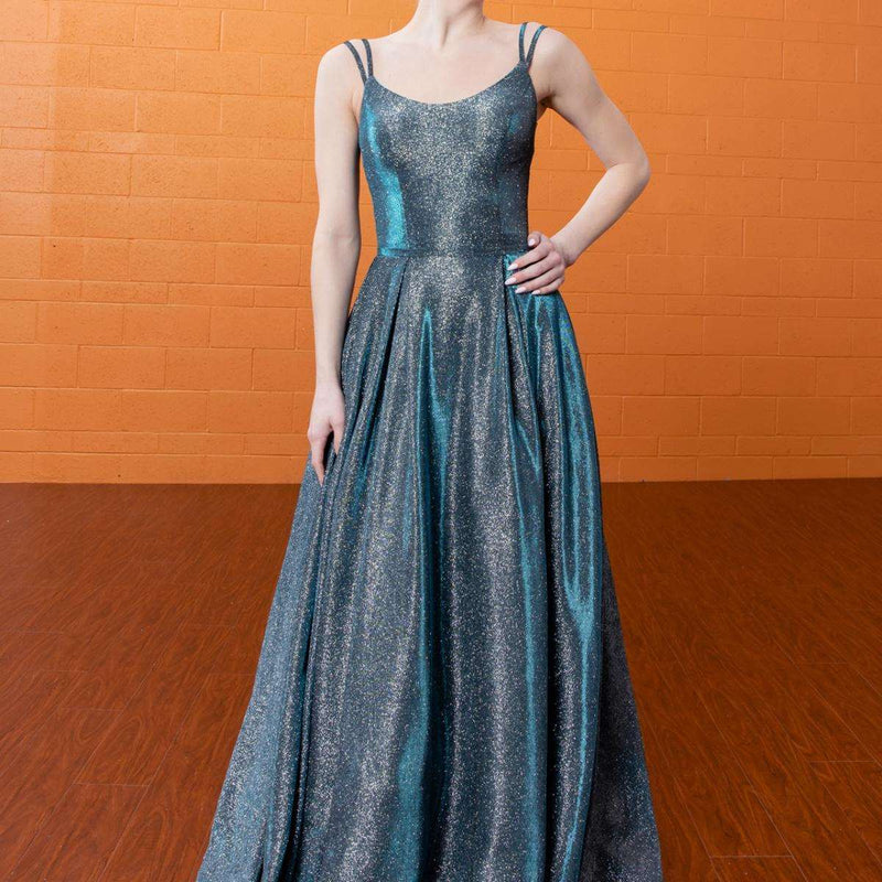 A beautiful gown, off-shoulder, reveals noble air.