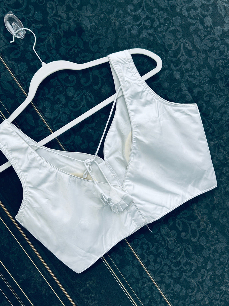 White sleeveless blouse