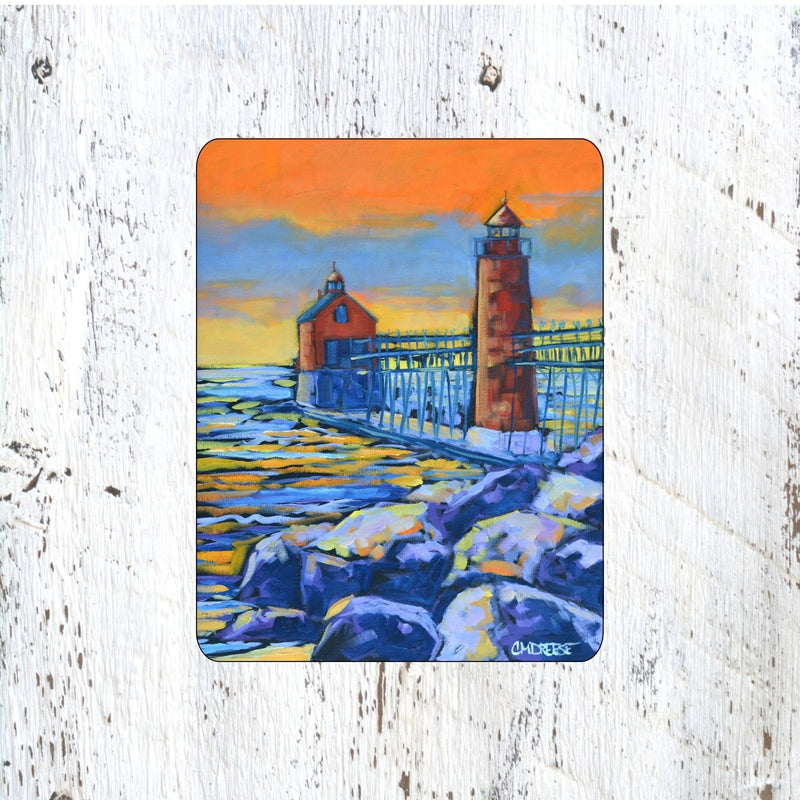 Mousepad: Grand Haven Lighthouse. Burning Sky, Quiet Shore.