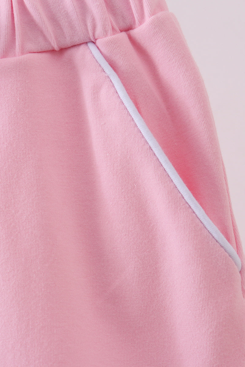 Pink scallop hem bow skort