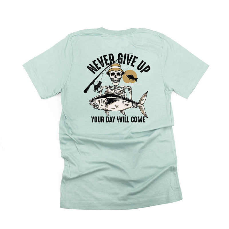 Fishing Skelly - Never Give Up (pf&b) - Unisex Tee