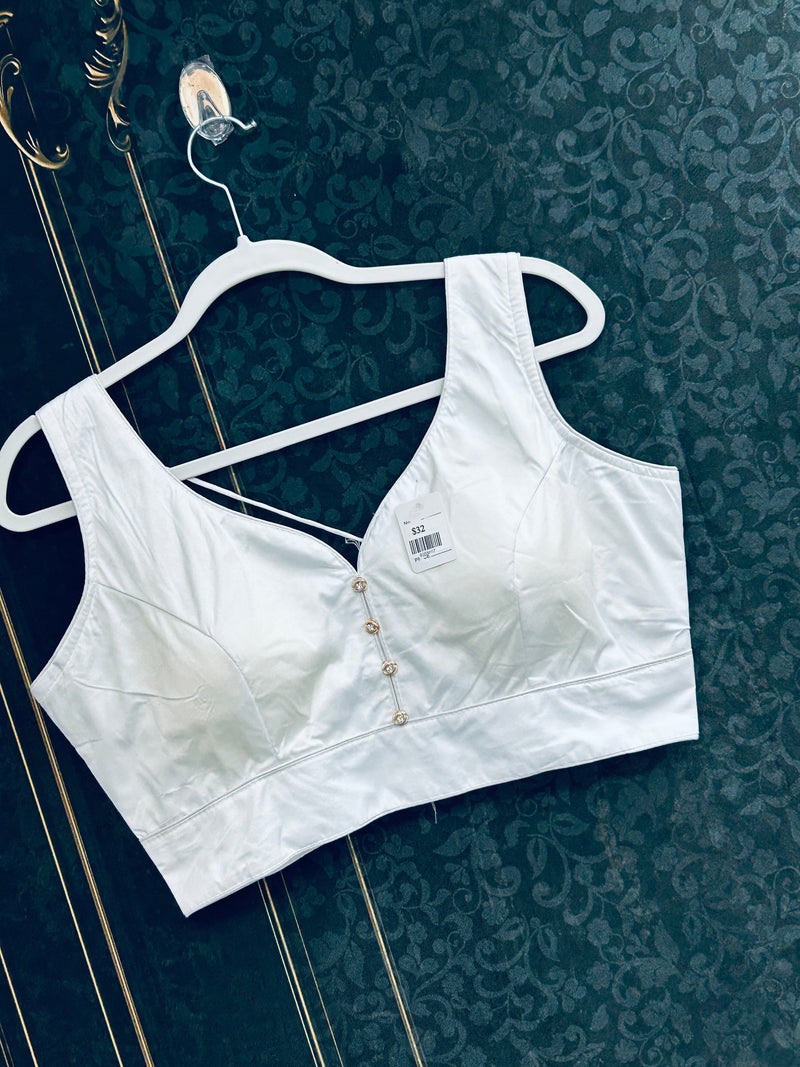 White sleeveless blouse