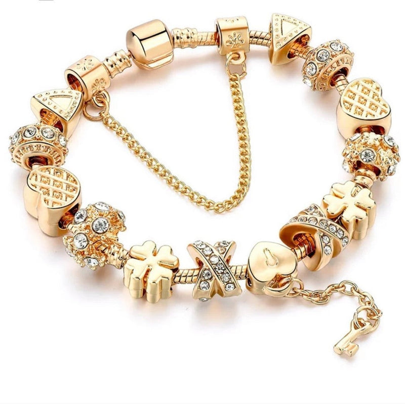 14K Gold  Charm Bracelet with crystals from Swarovski