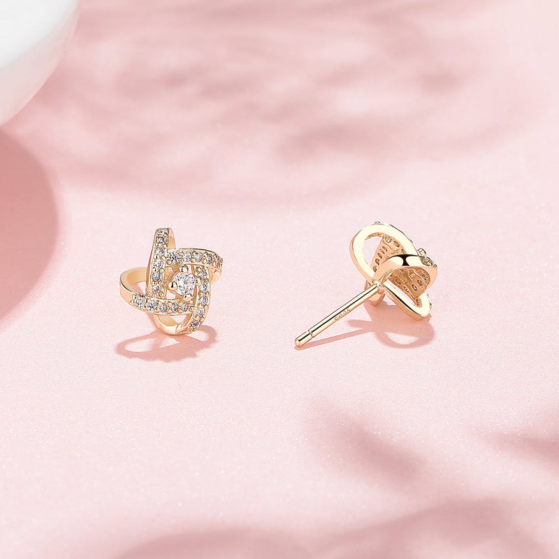 Sterling Silver Love Knot Stud Earrings with crystals from Swarovski