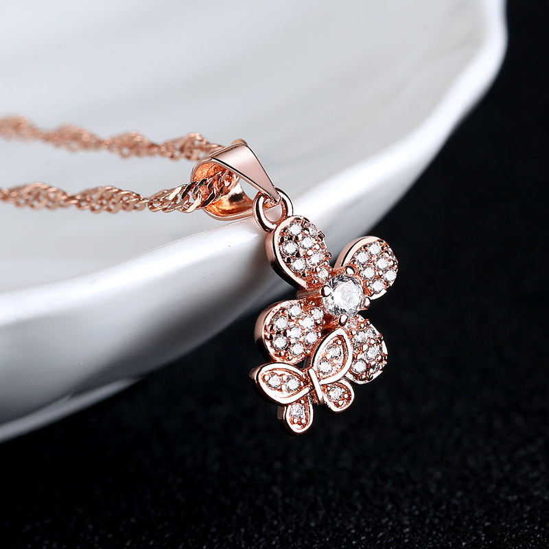 Sterling Silver and Genuine Crystal Butterfly on Flower Pendant Necklace