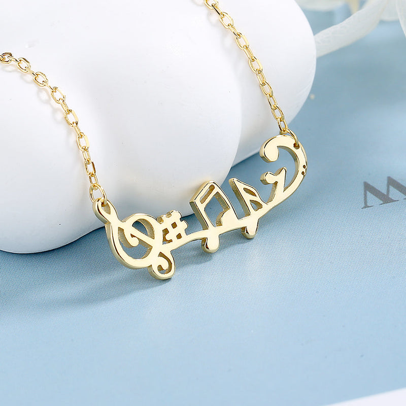 14K Gold and Sterling Silver Musical Notes Necklace