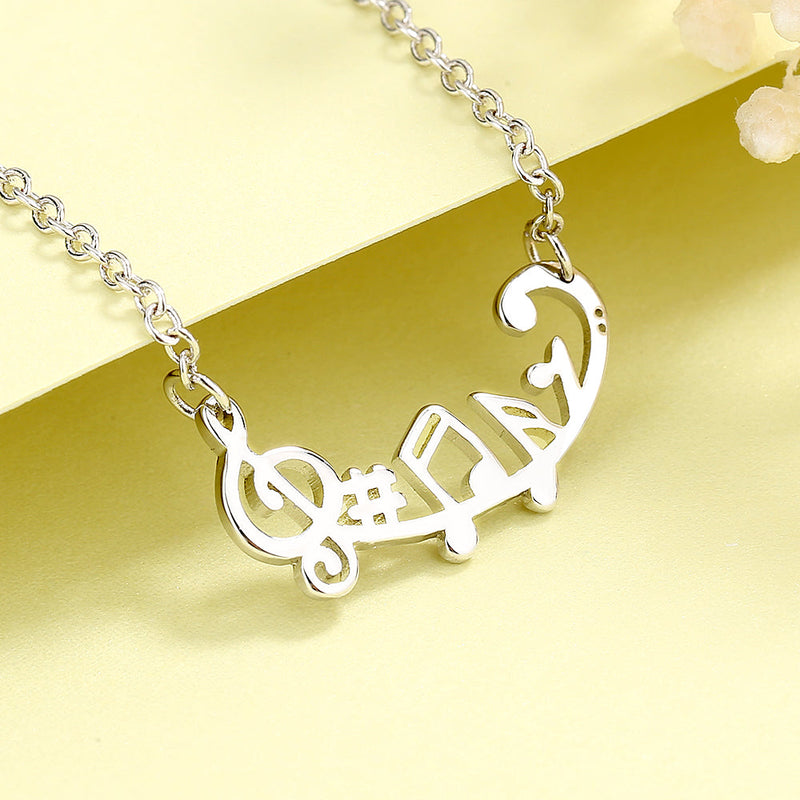 14K Gold and Sterling Silver Musical Notes Necklace