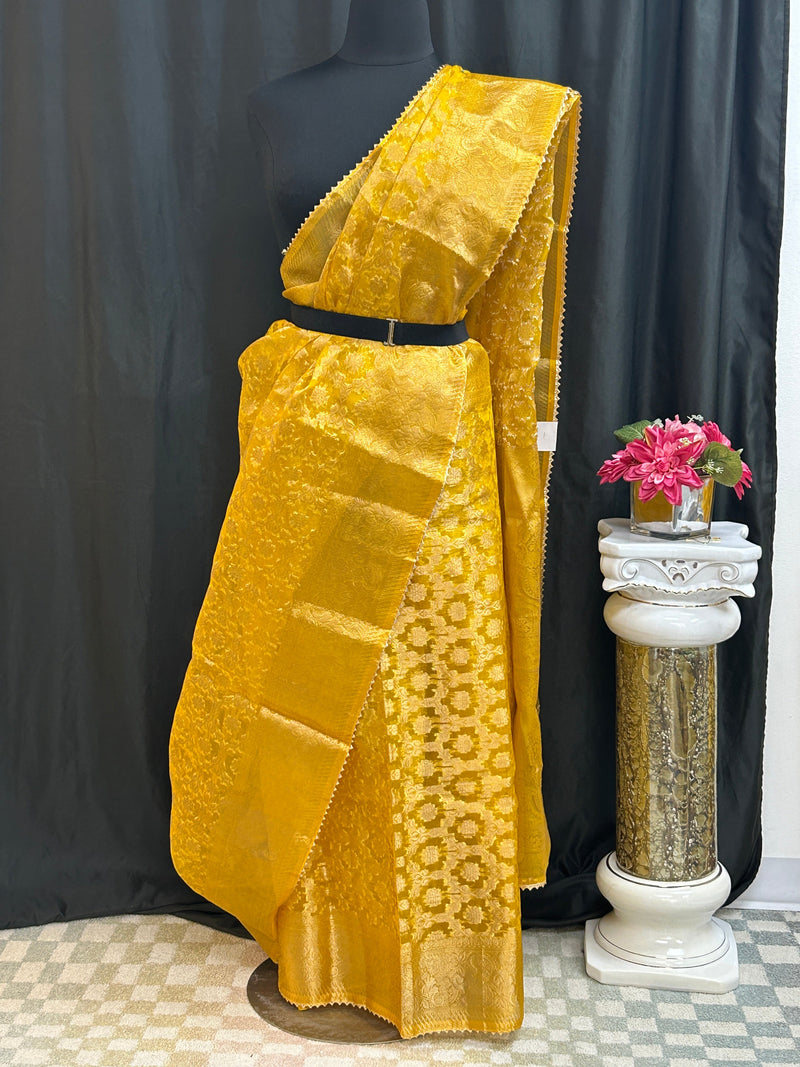 Tissue organza saree with all over jari weaving