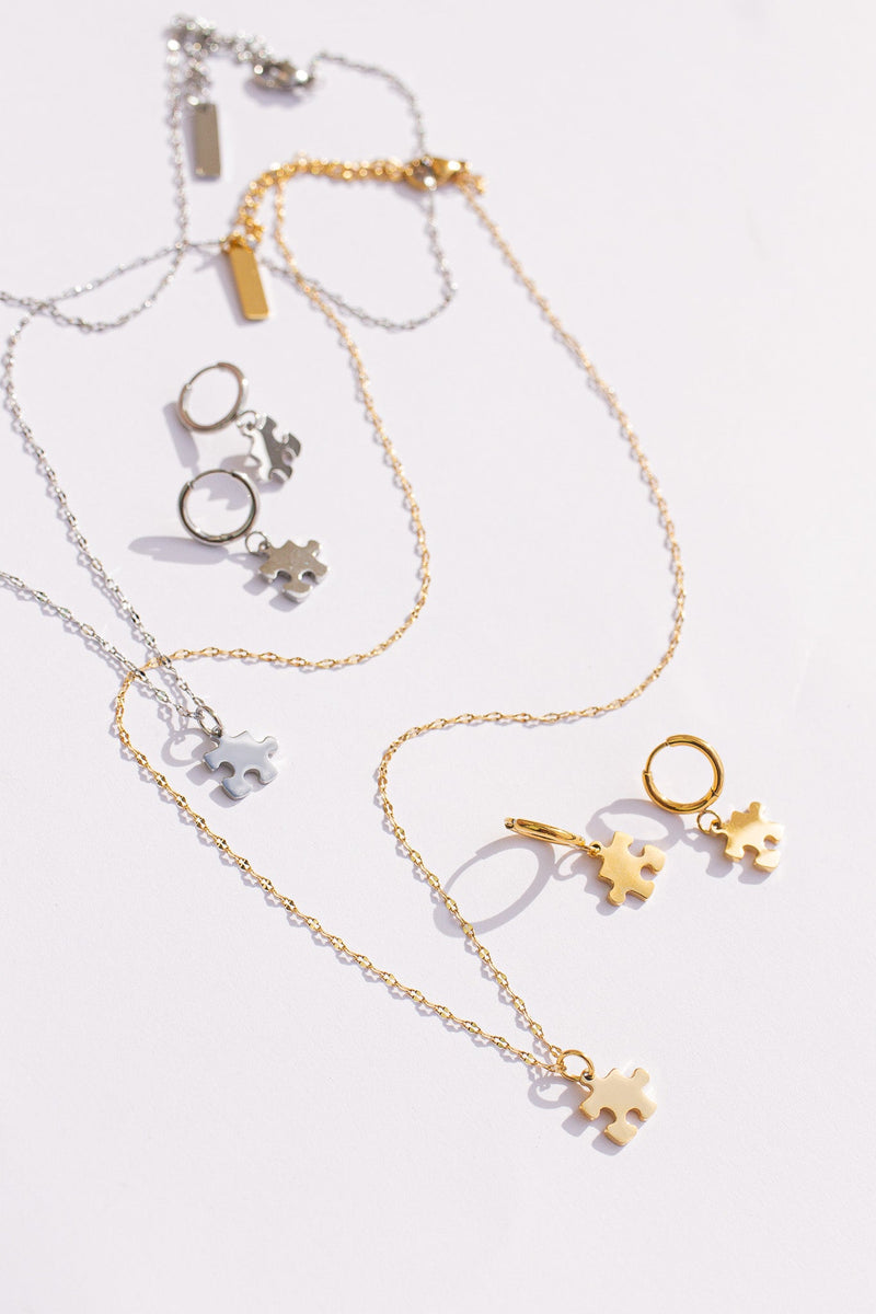 Puzzle Piece Huggie Hoops