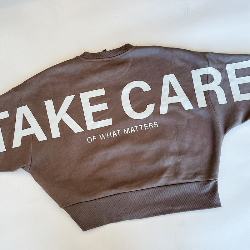 TAKE CARE OF WHAT MATTERS - Embroidered/Printed Crop Sweatshirt