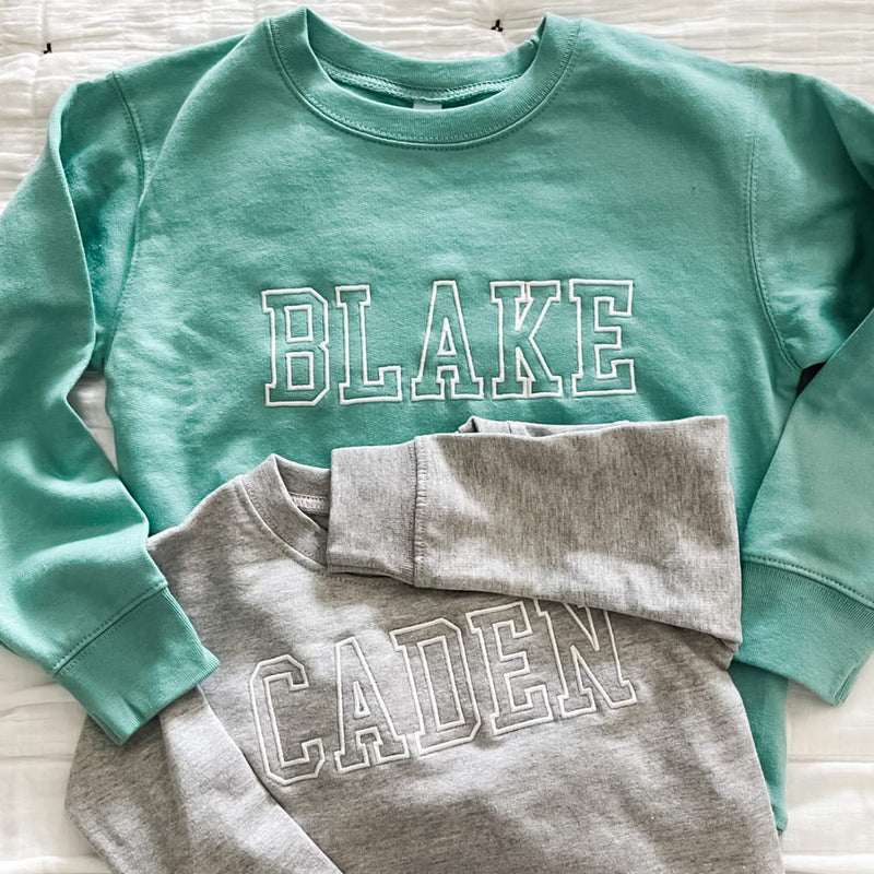 CUSTOM EMBROIDERED OUTLINE NAME - CHILD SWEATER