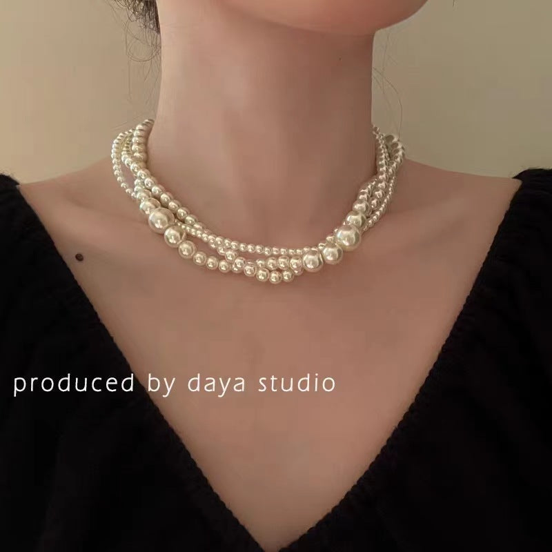 Twisted Multi-Strand Simulated Pearl Glass Bead Statement Necklace