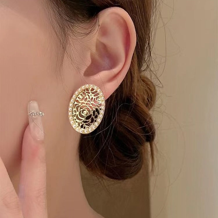 Hollow Pearl Oval Retro Earrings