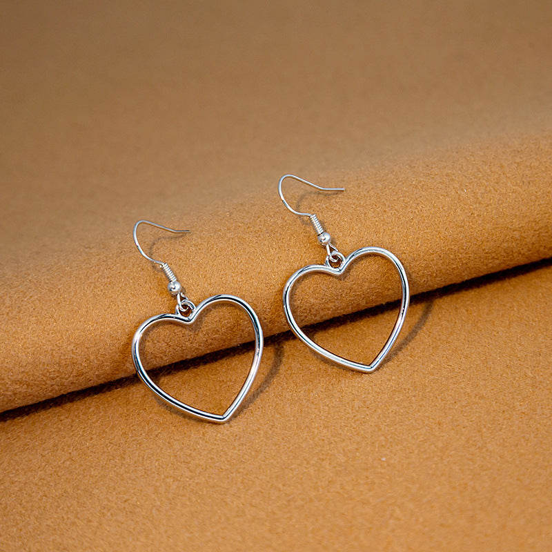 Hollow Peach Heart Stud Earrings