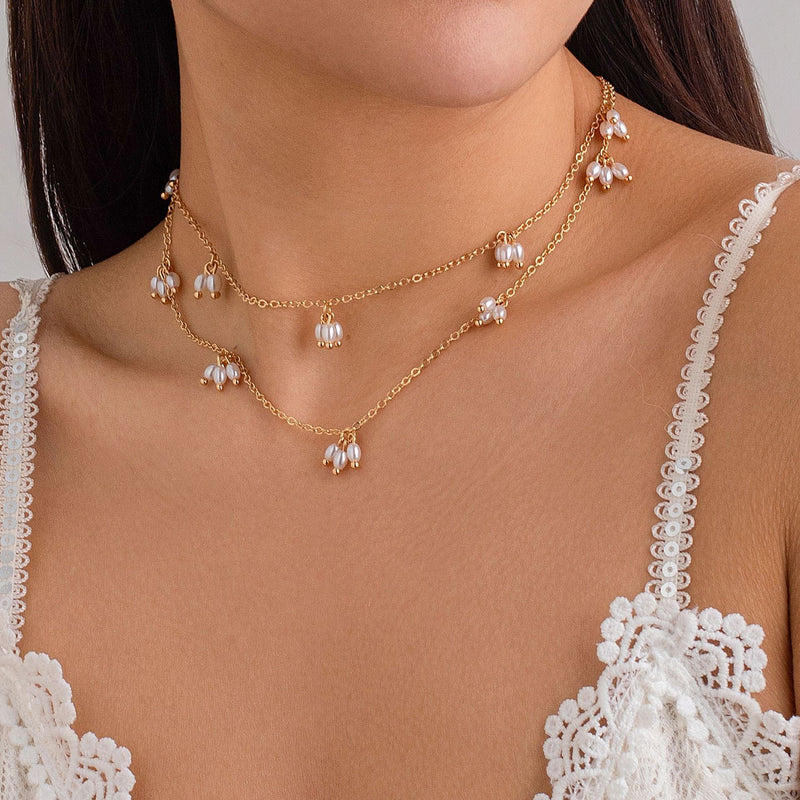 Elegant Faux White Pearl Necklace with Long Gold-Plated Tassels