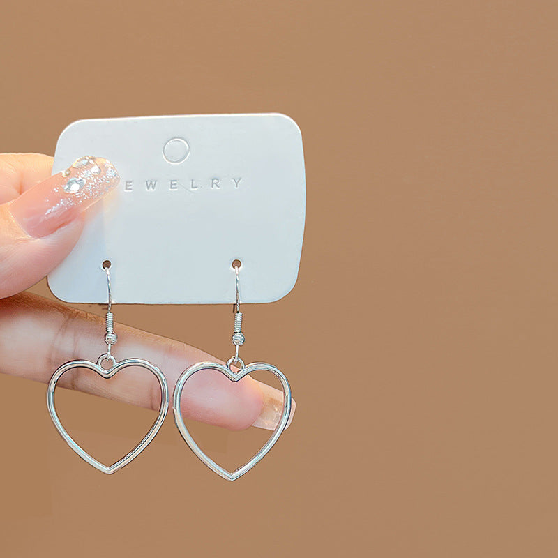 Hollow Peach Heart Stud Earrings