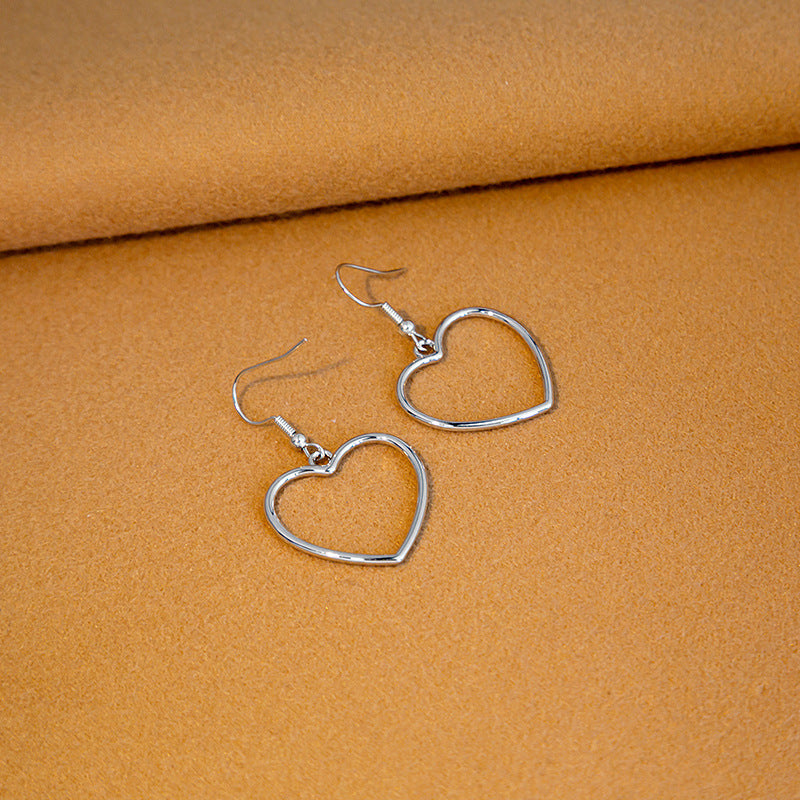 Hollow Peach Heart Stud Earrings