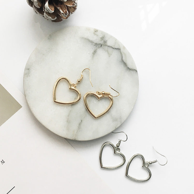 Hollow Peach Heart Stud Earrings