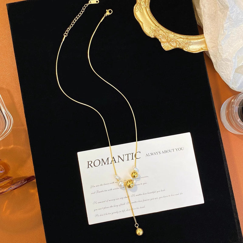 Snake Bone Chain Pearl Pendant Necklace