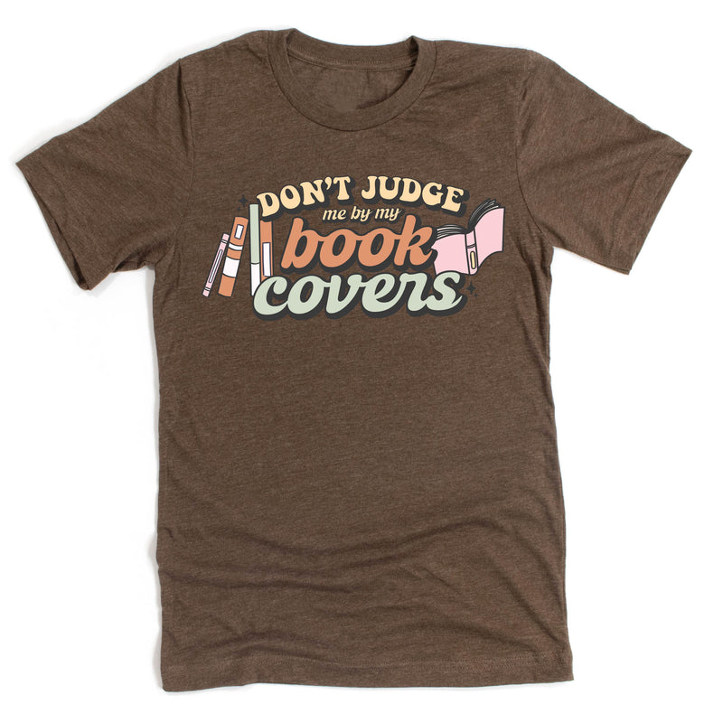 Don't Judge Me By My Book Covers - Unisex Tee