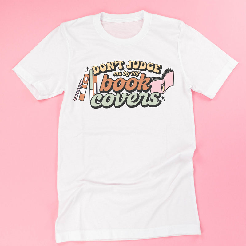 Don't Judge Me By My Book Covers - Unisex Tee