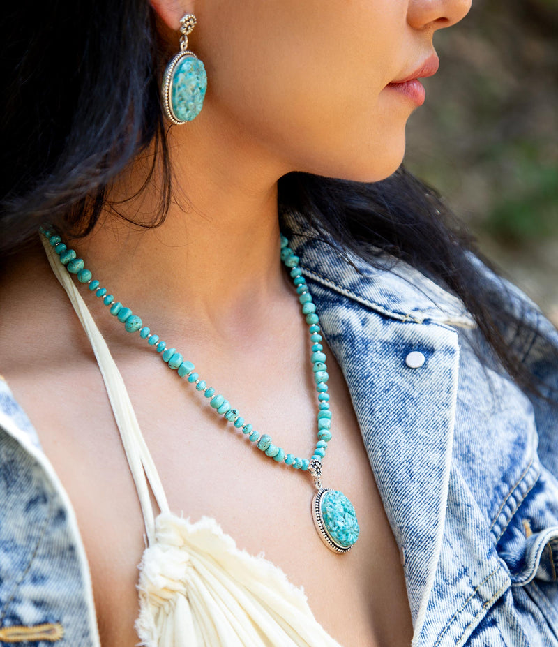 Carved Blue Turquoise and Sterling Silver Pendant
