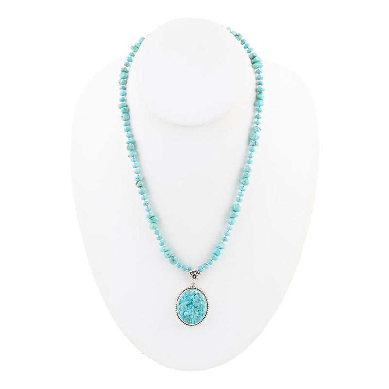 Carved Blue Turquoise and Sterling Silver Pendant