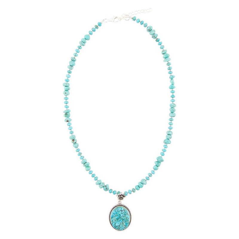 Carved Blue Turquoise and Sterling Silver Pendant