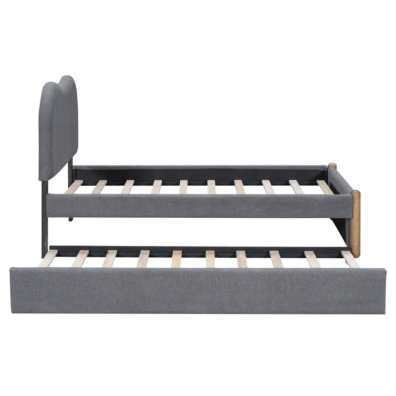 Upholstered Platform Bed With Wood Supporting Feet And Trundle
