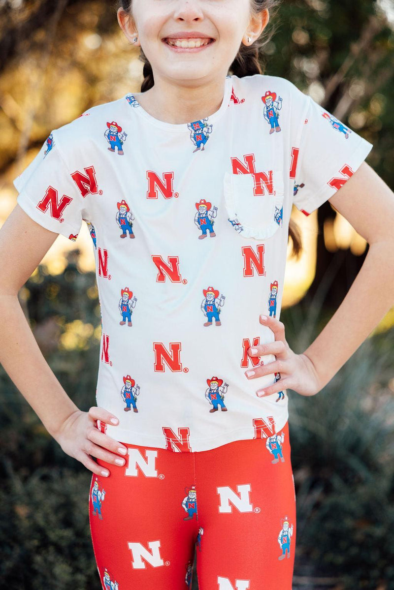 Nebraska White Herbie Husker Ruffle Pocket Tee