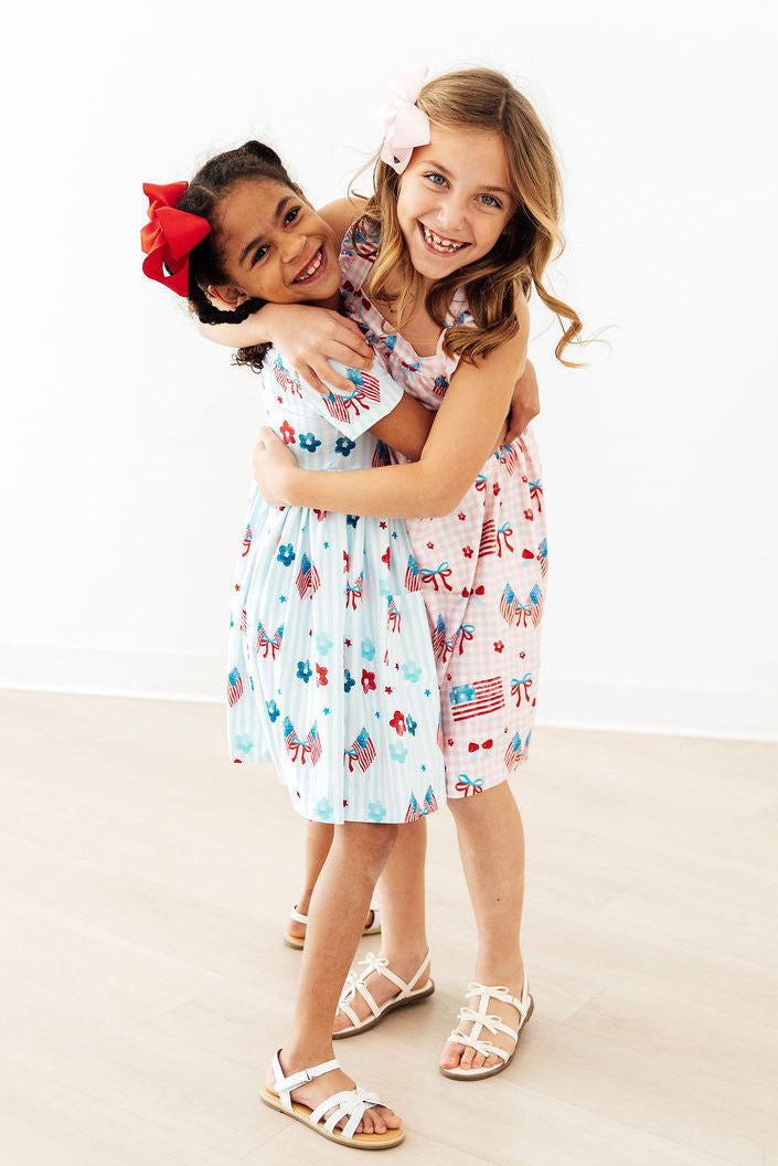 Fancy Flags Ruffle Cross Back Dress